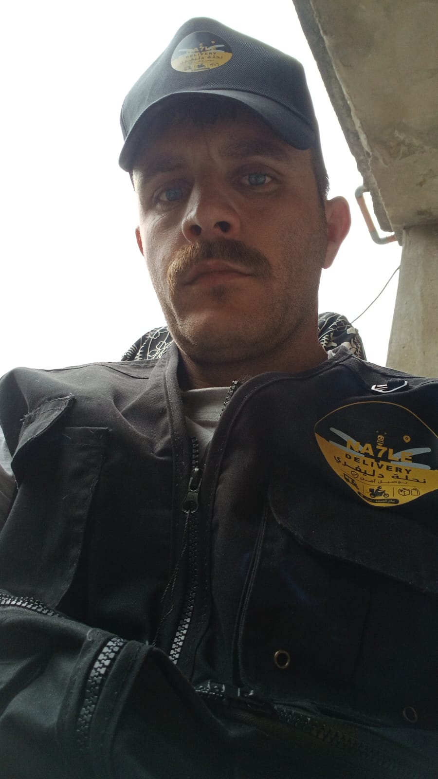 Na7le team member in uniform